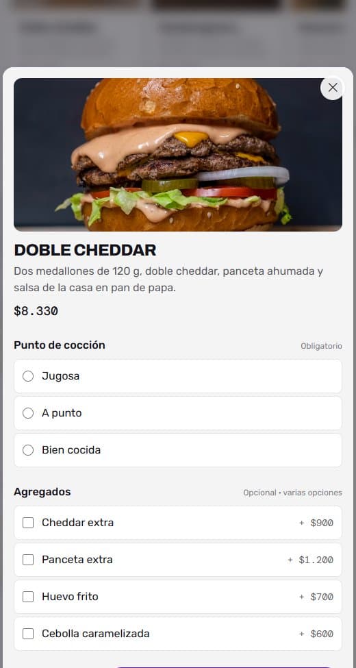 Detalle de una hamburguesa con las opciones de punto de cocción y los agregados